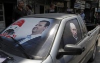 Obama warns Russia against aiding Assad regime