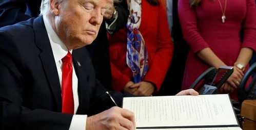 trumpsigning_small1 Public Has a Right to See Trump Ad Civil Rights  